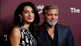 أمل وجورج كلوني في ظهور نادر على السجادة الحمراء.